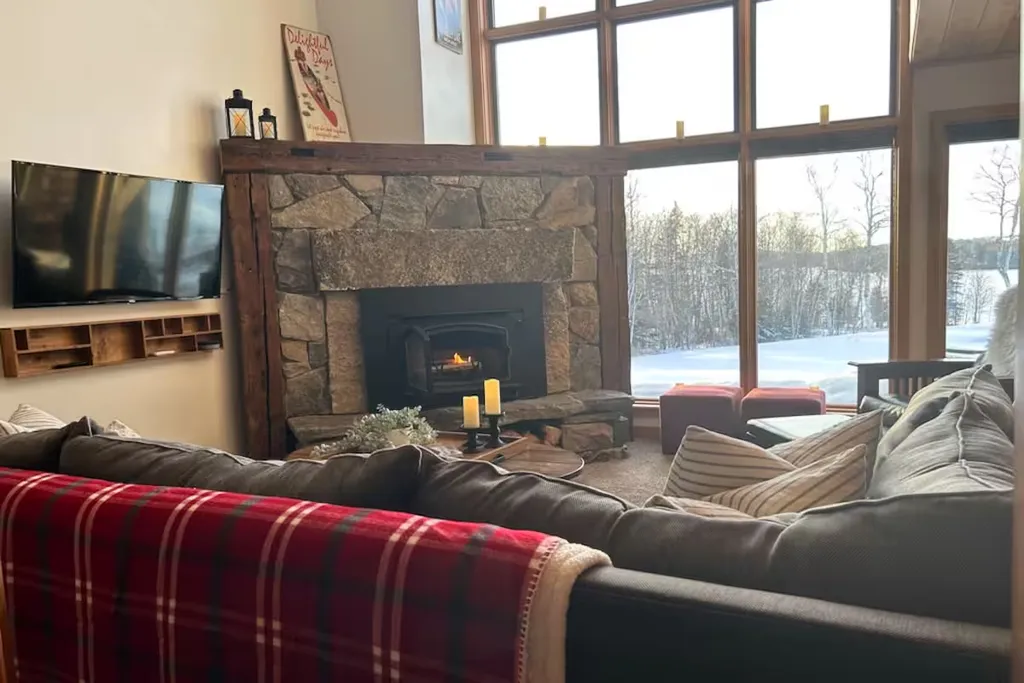 Living room beside the wood-burning fireplace